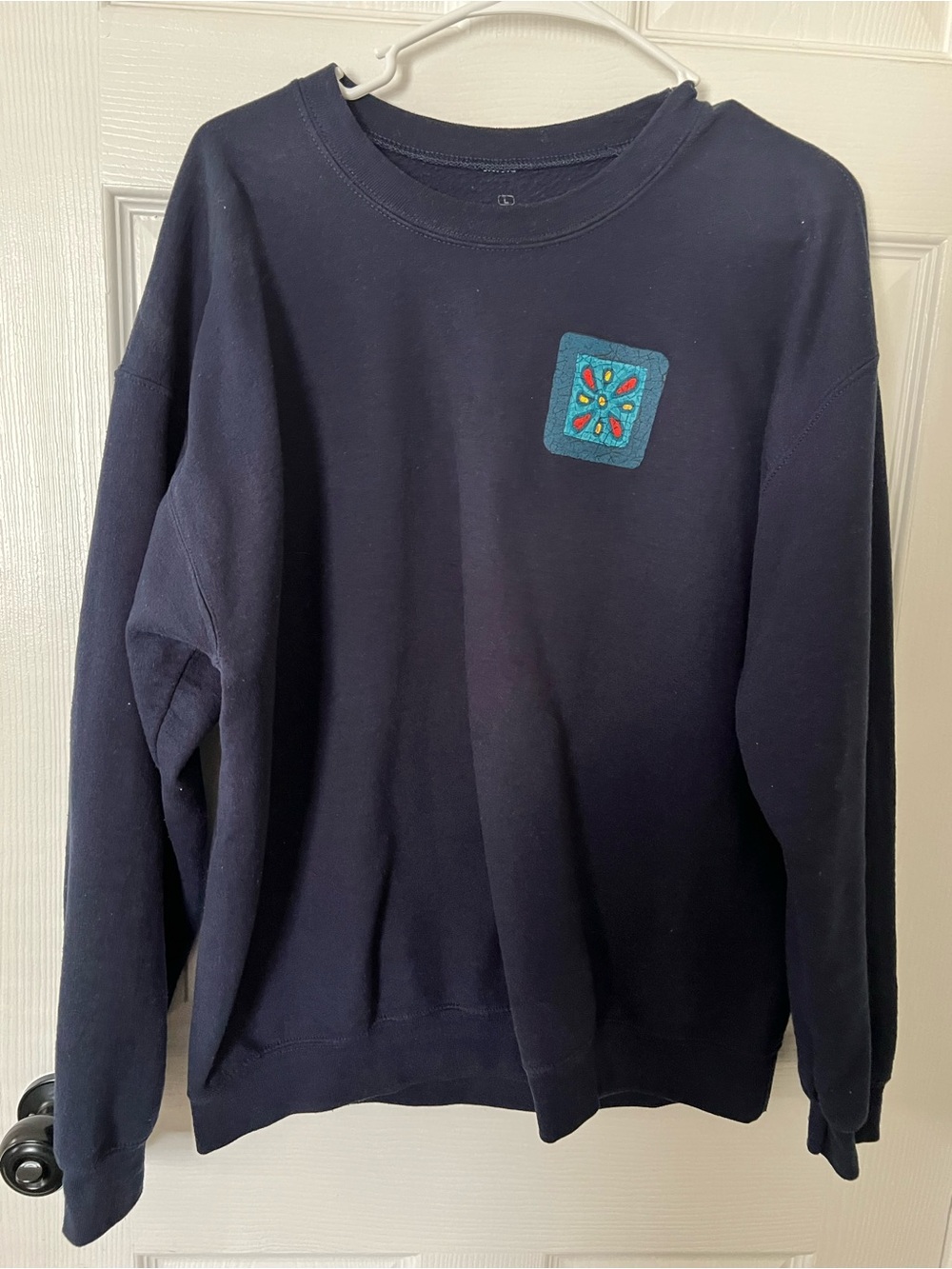 Modelo Navy Crewneck with Teal Embroidered Patch